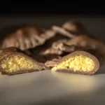 Ajdovi krapi polnjeni s skuto in proseno kašo.